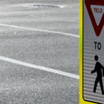 Pedestrian using marked crosswalk safely