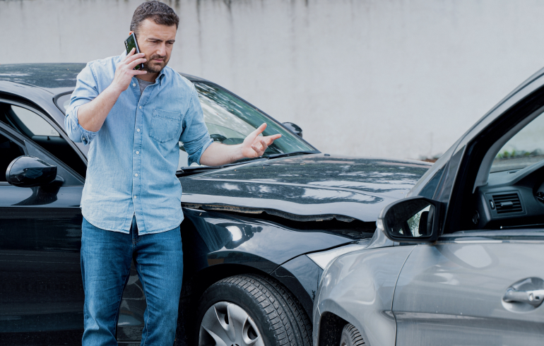 Car Accident Victim Talking on a Phone